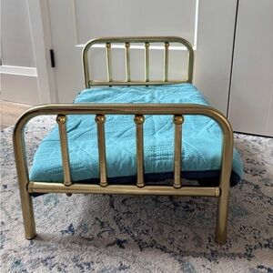 Brass Metal Twin Bed Frame with Blue Quilt